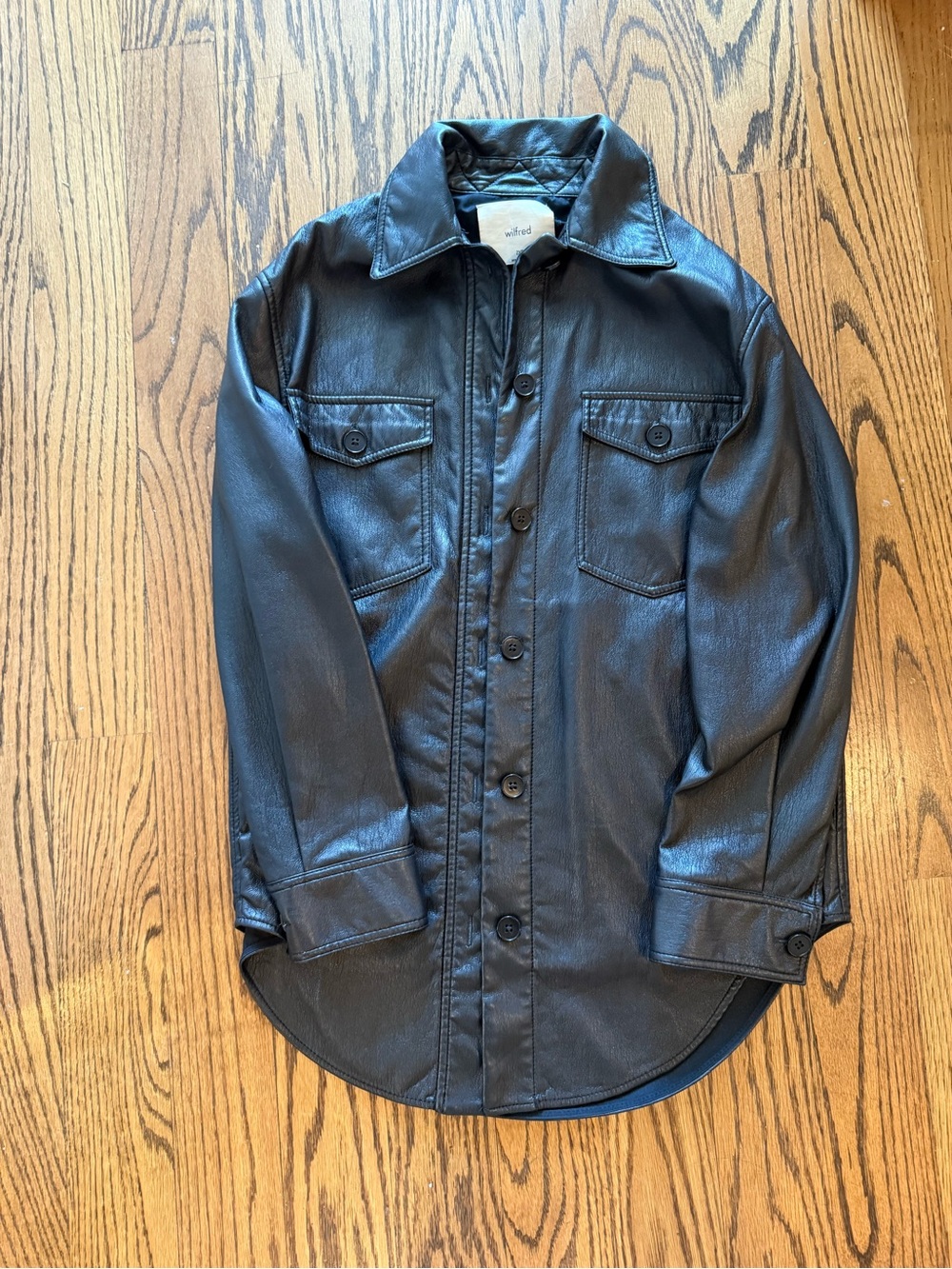 Aritzia Wilfred Black leather button-up jacket with a relaxed fit